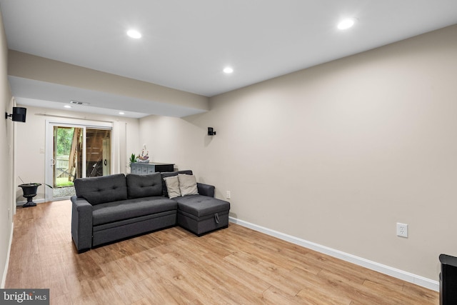 9304 Taverney Ter, Gaithersburg, MD 20879 - living room featuring light wood-style flooring and recessed lighting