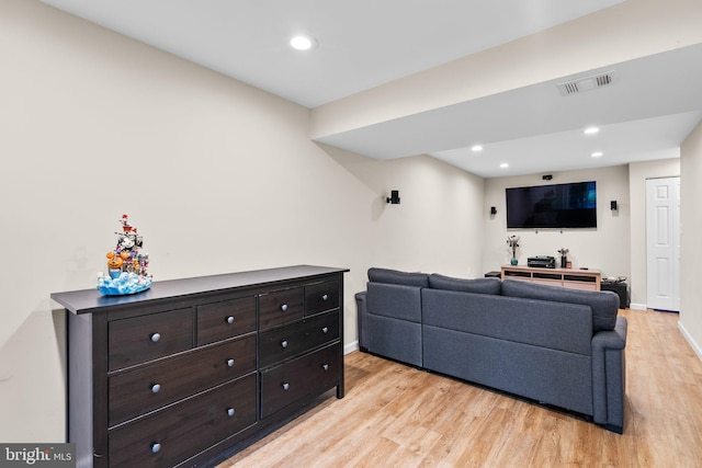 9304 Taverney Ter, Gaithersburg, MD 20879 - living area with light wood-style flooring and recessed lighting