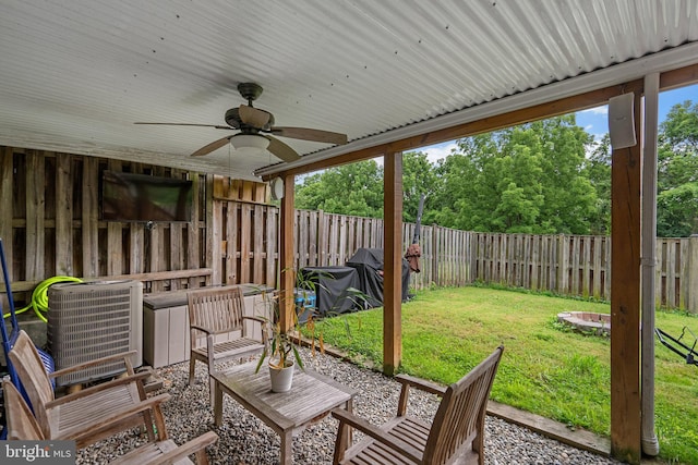9304 Taverney Ter, Gaithersburg, MD 20879 - fenced backyard with a ceiling fan and a patio