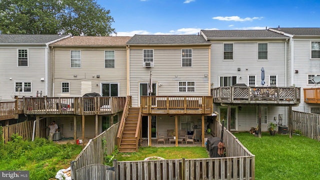 9304 Taverney Ter, Gaithersburg, MD 20879 - rear view of property with a wooden deck, a fenced backyard, and stairway