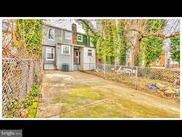 1206 Darley Ave, Baltimore, MD 21218 - view of front facade with a fenced backyard
