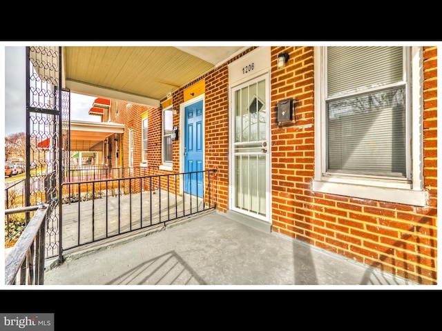 1206 Darley Ave, Baltimore, MD 21218 - entrance to property with brick siding and covered porch