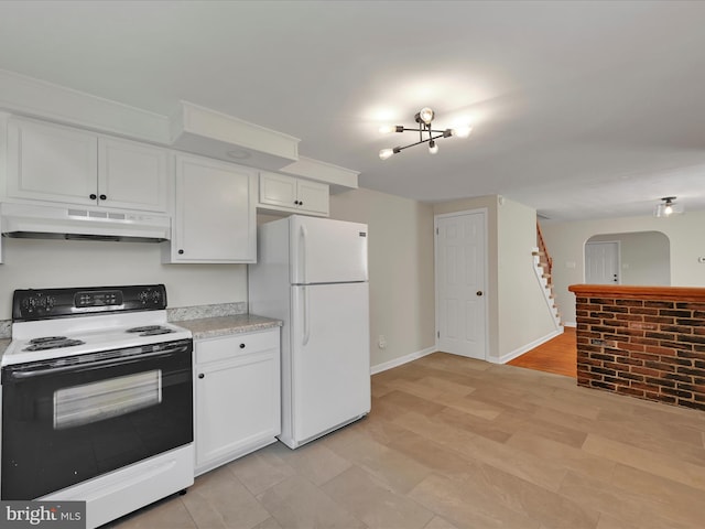 41 W George St, York, PA 17408 - kitchen featuring electric range, freestanding refrigerator, under cabinet range hood, light countertops, and white cabinetry