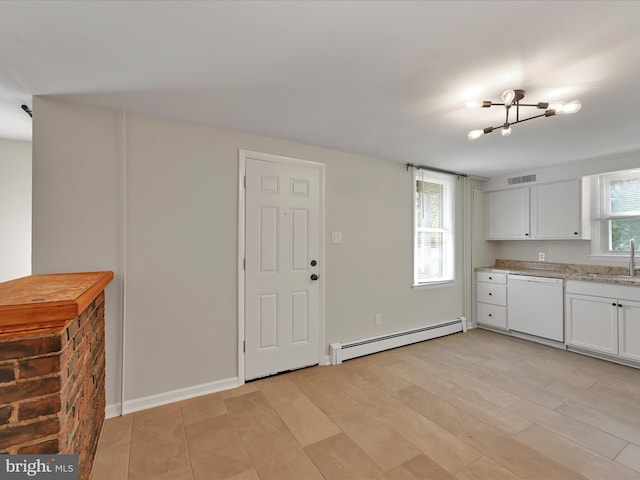 41 W George St, York, PA 17408 - kitchen featuring baseboard heating, white dishwasher, white cabinets, a chandelier, and light wood-style flooring