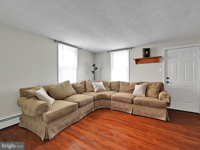 41 W George St, York, PA 17408 - living area featuring wood finished floors and baseboard heating