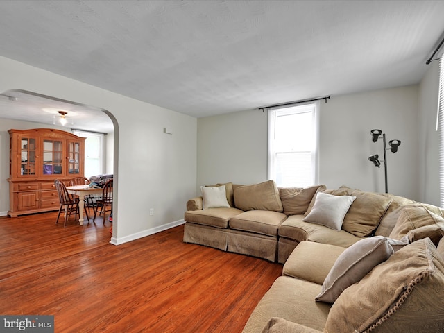 41 W George St, York, PA 17408 - living area featuring arched walkways and wood finished floors