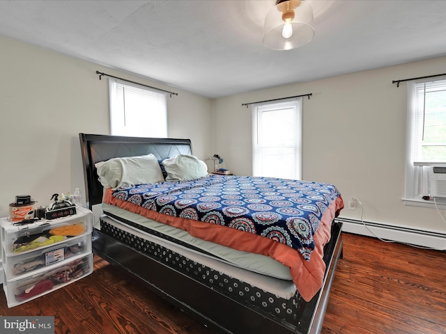 41 W George St, York, PA 17408 - bedroom featuring a baseboard heating unit and wood finished floors