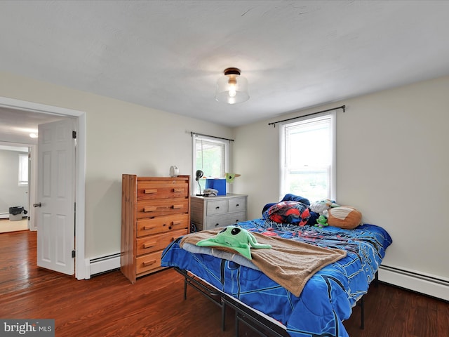 41 W George St, York, PA 17408 - bedroom with baseboard heating and wood finished floors