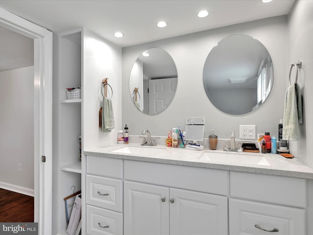 41 W George St, York, PA 17408 - full bath featuring double vanity, wood finished floors, and recessed lighting