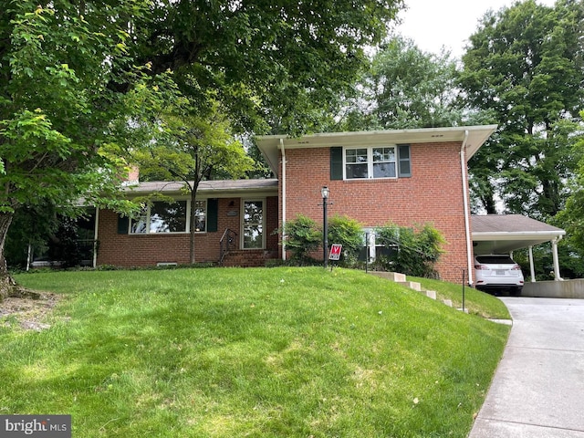 7205 Bayside Ct, Mclean, VA 22101 - tri-level home featuring a front yard, brick siding, concrete driveway, and a chimney