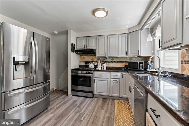 15 Pearson Dr, Springfield, PA 19064 - kitchen with stainless steel appliances, under cabinet range hood, gray cabinetry, and backsplash