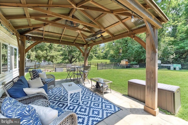 15 Pearson Dr, Springfield, PA 19064 - fenced backyard featuring a gazebo, an outdoor hangout area, a patio, and view of scattered trees