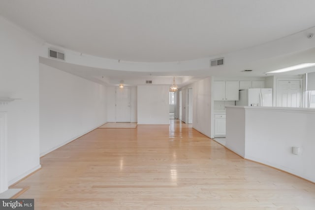 3835 9th St N Unit 1001W, Arlington, VA 22203 - unfurnished living room featuring light wood finished floors