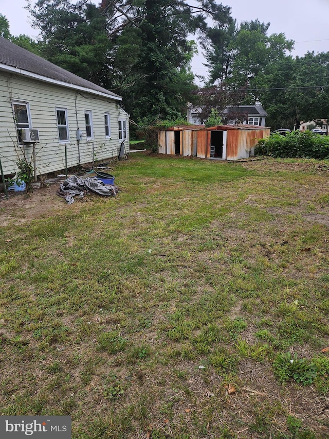 194 Blackwood Ave, Franklinville, NJ 08322 - view of green lawn with an outdoor structure and cooling unit