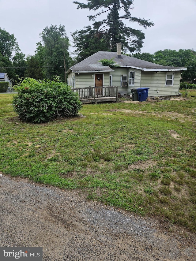 194 Blackwood Ave, Franklinville, NJ 08322 - view of front of house featuring a wooden deck, a front yard, and a chimney