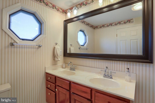 1339 Georgetown Cir, Carlisle, PA 17013 - bathroom featuring wallpapered walls and double vanity
