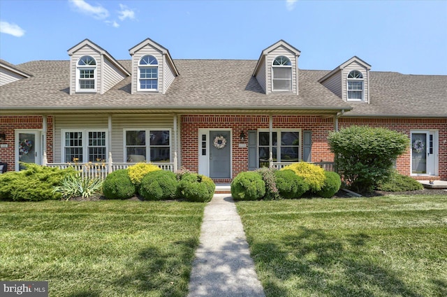 1339 Georgetown Cir, Carlisle, PA 17013 - cape cod home featuring a front lawn, roof with shingles, and covered porch