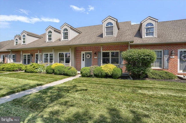 1339 Georgetown Cir, Carlisle, PA 17013 - cape cod home with brick siding, a front lawn, and roof with shingles