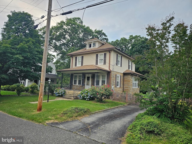 401 Villanova Rd, Glassboro, NJ 08028 - traditional style home with covered porch, a front lawn, and stone siding