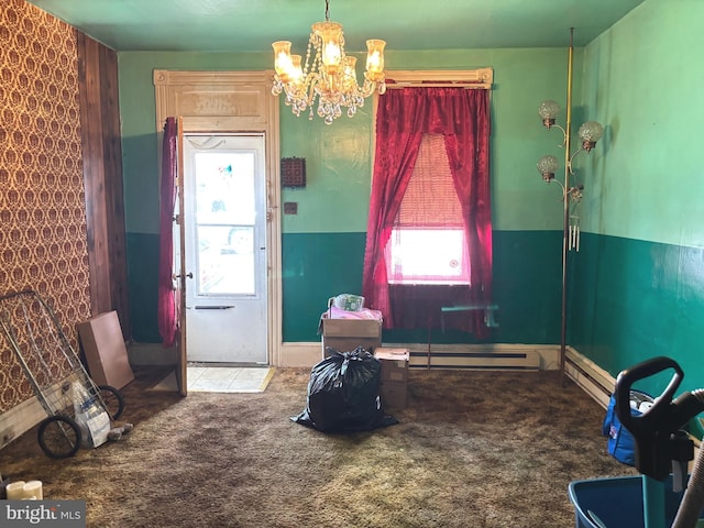 330 W Poplar St, Shenandoah, PA 17976 - carpeted dining room featuring a chandelier, plenty of natural light, and a baseboard radiator
