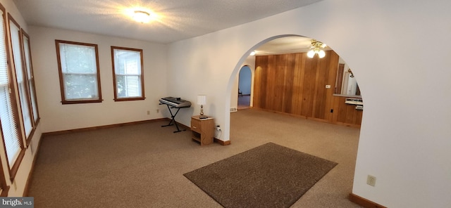 28 Victory Rd, Bridgeton, NJ 08302 - spare room featuring arched walkways, carpet flooring, and a ceiling fan
