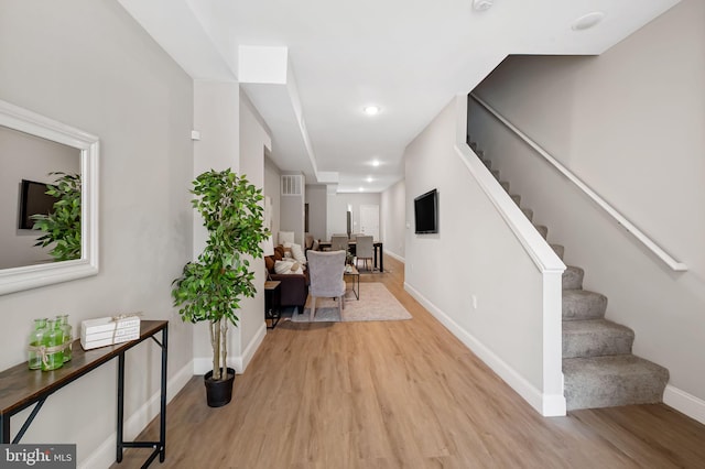1607 Clifton Ave, Baltimore, MD 21217 - entrance foyer with wood finished floors, stairway, and recessed lighting