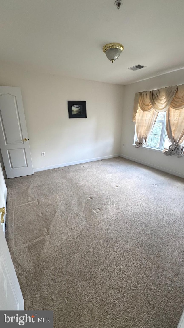 10005 Erion Ct, Bowie, MD 20721 - unfurnished room featuring carpet floors and a pendent fire sprinkler