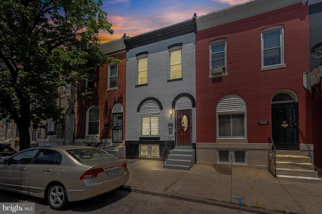 2328 E Hoffman St, Baltimore, MD 21213 - view of property featuring entry steps and brick siding