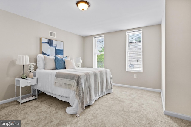 2328 E Hoffman St, Baltimore, MD 21213 - bedroom with baseboards and carpet flooring