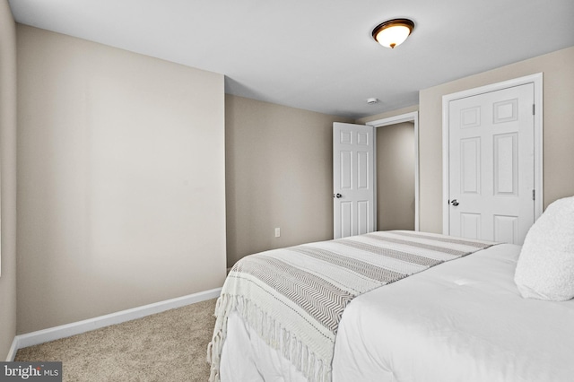 2328 E Hoffman St, Baltimore, MD 21213 - bedroom featuring carpet flooring and baseboards