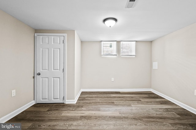 2328 E Hoffman St, Baltimore, MD 21213 - basement with wood finished floors and baseboards