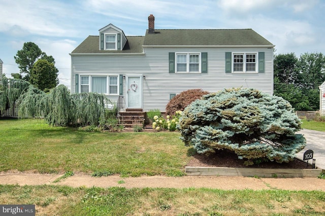 103 David Rd, Wilmington, DE 19804 - view of front facade featuring a front yard and a chimney