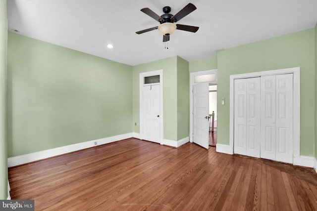 1223 Euclid St NW, Washington, DC 20009 - unfurnished bedroom with hardwood / wood-style flooring, multiple closets, ceiling fan, and recessed lighting