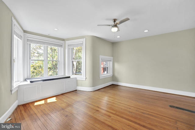 1223 Euclid St NW, Washington, DC 20009 - spare room with ceiling fan, wood-type flooring, and recessed lighting