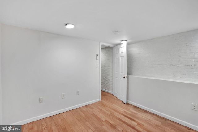 1223 Euclid St NW, Washington, DC 20009 - spare room with baseboards and wood finished floors