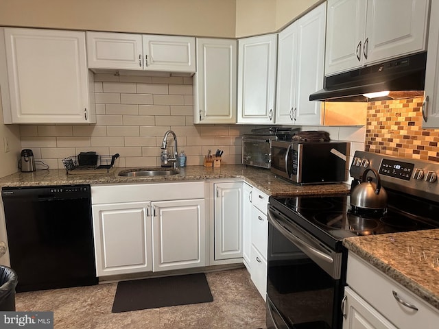 99 Liborio Ln, New Castle, DE 19720 - kitchen featuring stainless steel appliances, under cabinet range hood, white cabinets, and backsplash