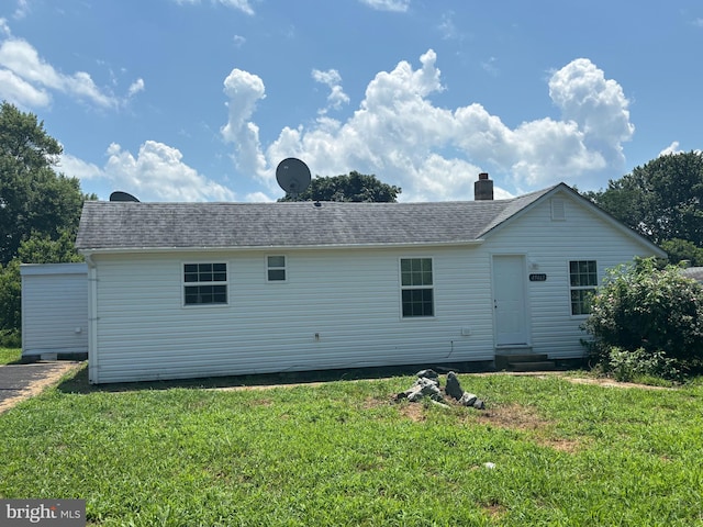 49461 Bayne Rd, Ridge, MD 20680 - back of property featuring entry steps, a lawn, and a chimney