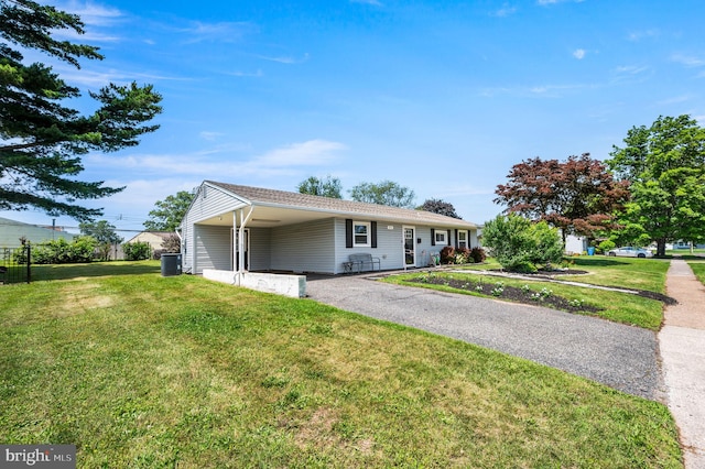 41 Good Ln, Levittown, PA 19055 - ranch-style home with a front yard, asphalt driveway, and an attached carport