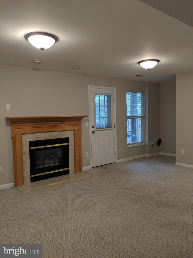 46838 Graham Cove Sq, Sterling, VA 20165 - unfurnished living room with a tile fireplace and light colored carpet