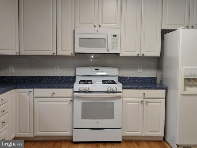 46838 Graham Cove Sq, Sterling, VA 20165 - kitchen with white appliances, decorative backsplash, dark countertops, white cabinetry, and light wood-style flooring