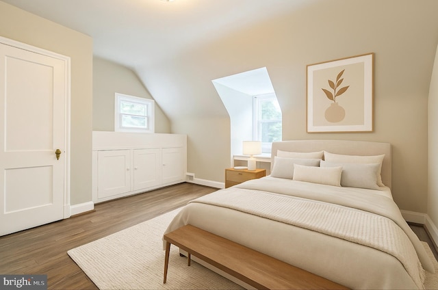 2504 Parkview Rd, Baltimore, MD 21207 - bedroom with wood finished floors and lofted ceiling