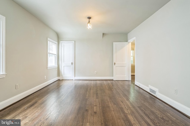 2504 Parkview Rd, Baltimore, MD 21207 - empty room with wood finished floors and baseboards
