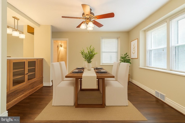 2504 Parkview Rd, Baltimore, MD 21207 - dining room with plenty of natural light, dark wood-type flooring, and a ceiling fan