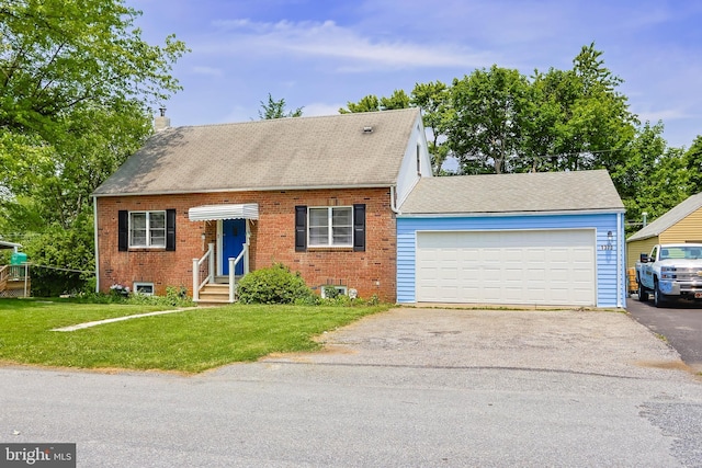 1373 Puggy Ln, Bethlehem, PA 18015 - cape cod home featuring a chimney, entry steps, driveway, an attached garage, and brick siding