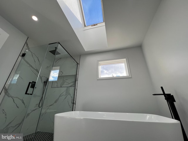 106 Lynx Ln, Effort, PA 18330 - bathroom featuring a soaking tub, a marble finish shower, and recessed lighting
