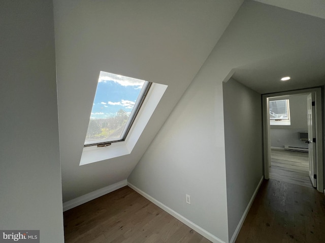 106 Lynx Ln, Effort, PA 18330 - additional living space with wood finished floors, a skylight, a baseboard radiator, plenty of natural light, and recessed lighting