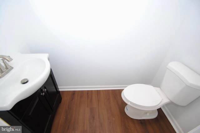 217 Wood St, Burlington, NJ 08016 - half bathroom featuring vanity and wood finished floors