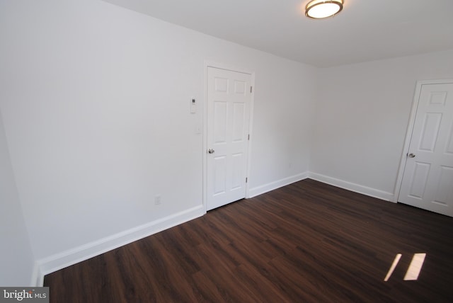 217 Wood St, Burlington, NJ 08016 - unfurnished room featuring dark wood-style flooring and baseboards