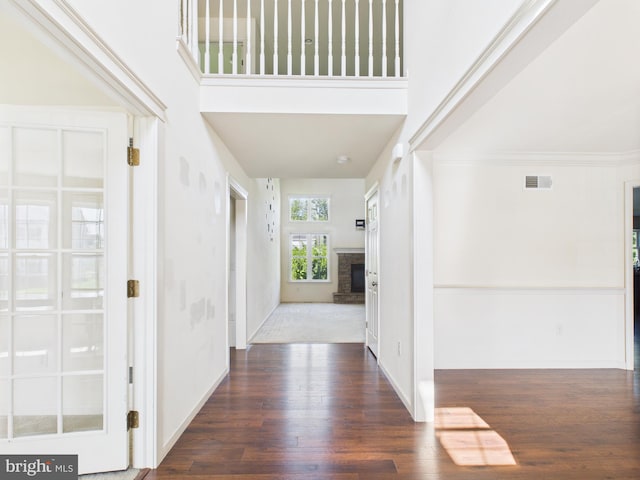 53 Hamlet Cir, Mechanicsburg, PA 17050 - foyer featuring dark wood finished floors, a fireplace, and a high ceiling