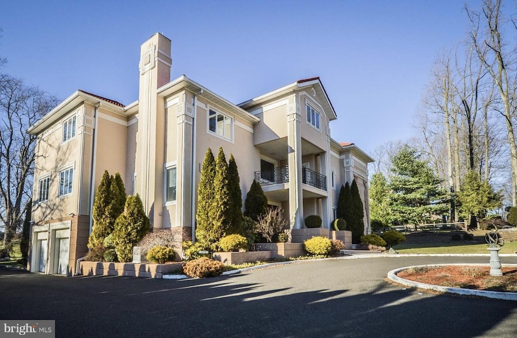 1439 Byberry Rd, Huntingdon Valley, PA 19006 - view of property with an attached garage